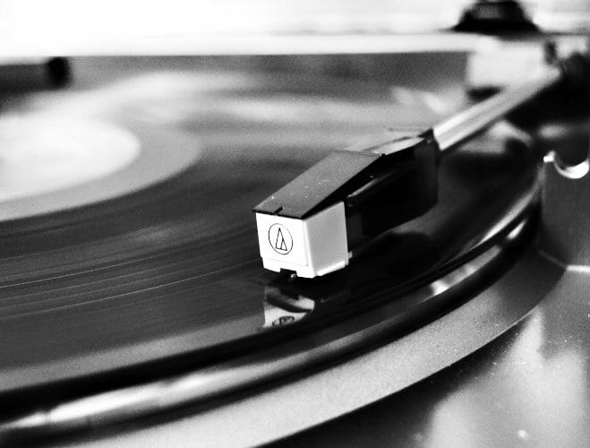 Record needle on a spinning turntable